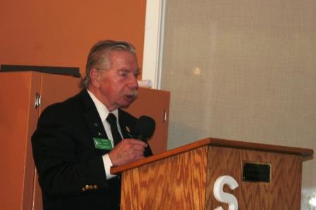 Commodore Jim Ross starts the meeting