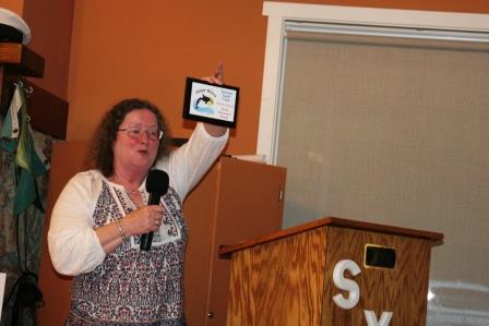 Fleet Captain Donna Mehl gives her report